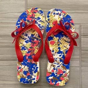 Red Valentino jelly and rubber flip flops.